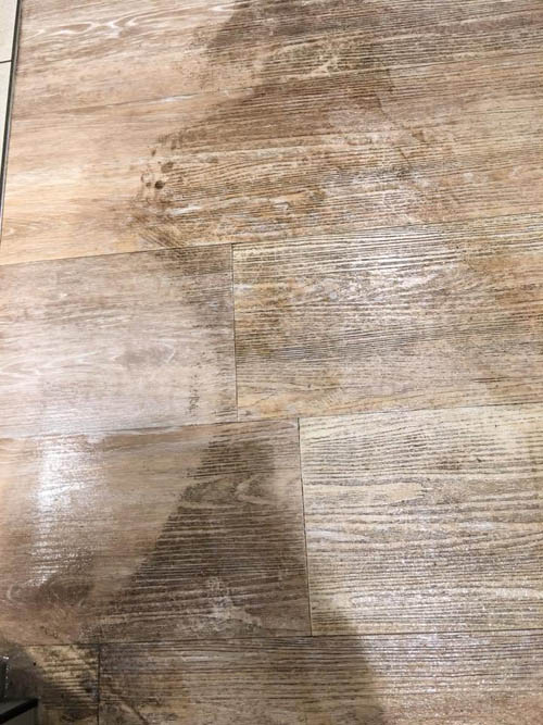 Grout lines restored with high-pressure tile and grout cleaning