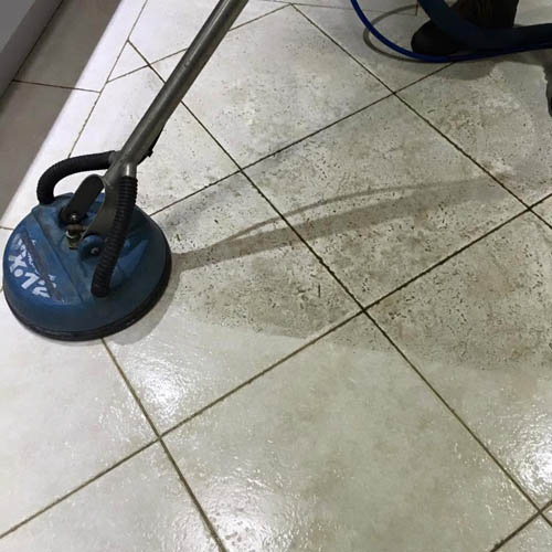 Before and after tile cleaning, the cleaned tiles much brighter