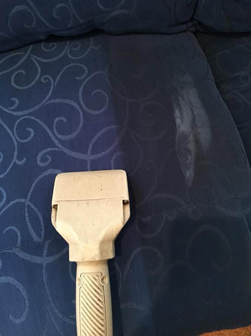Before and after upholstery cleaning on a fabric lounge