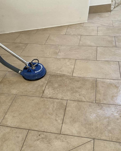 Tiles and grout lines restored by high-pressure cleaning